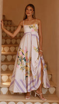 A collection of large swing suspender midi dresses in various prints and colors, including purple stripes, brown stripes, red floral, and different floral patterns.