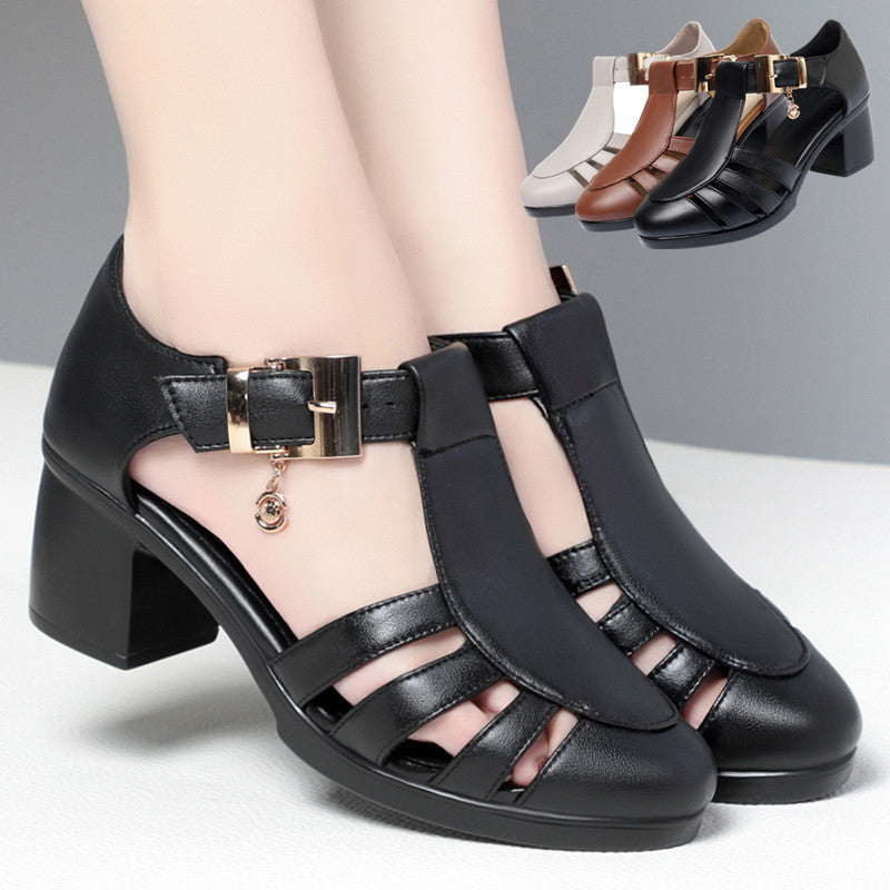 A pair of new style hollow sandals with a round toe and low heel, featuring a buckle closure and two-layer cowhide material.