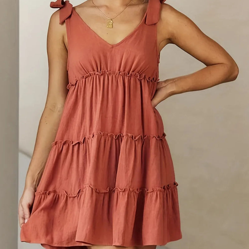 Full size frill v-neck tie shoulder mini dress in a solid color with ruffled details and an opaque finish -runwayfashionistacom