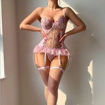 Close-up of a pink transparent floral embroidered mesh romper lingerie set for women.