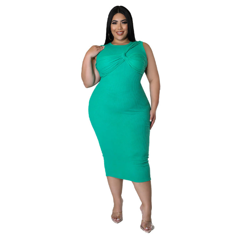 Woman wearing a green dress on a white background
