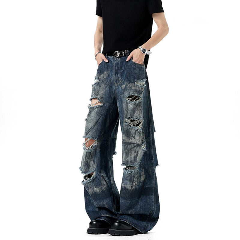 Dirty Stained And Ripped Jeans