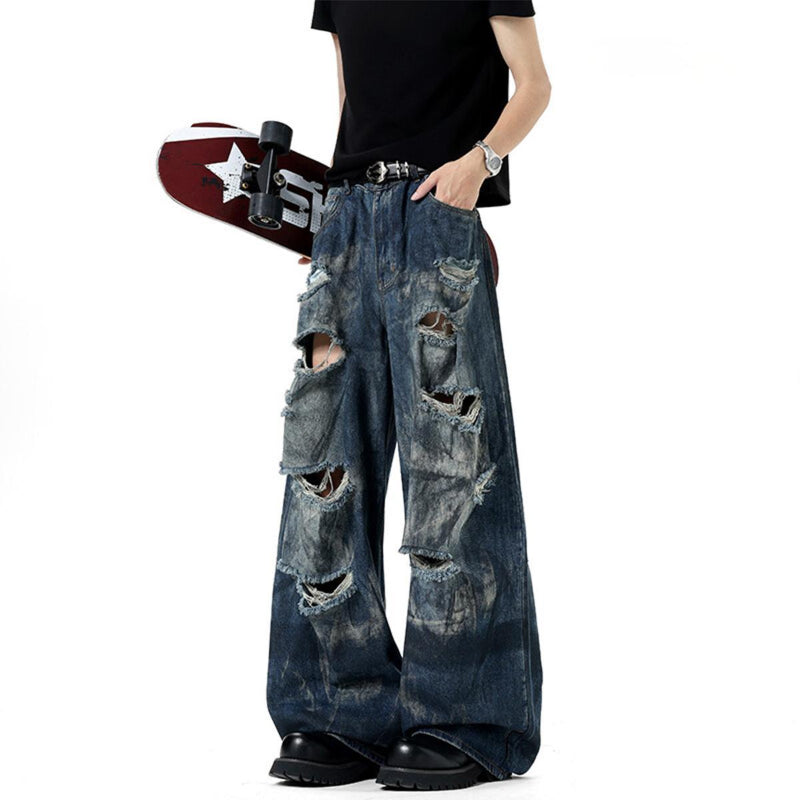 Dirty Stained And Ripped Jeans