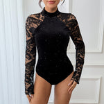 Black lace bodysuit with long sleeves on a white background