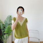 Pleated Corn Kernels Small Vest - runwayfashionista.com